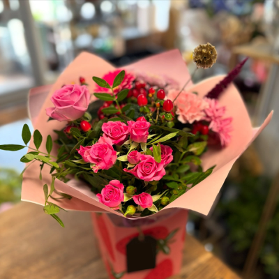Pink Delight Gift Bag - A charming floral gift bag in beautiful pink tones, thoughtfully arranged to make any occasion extra special.