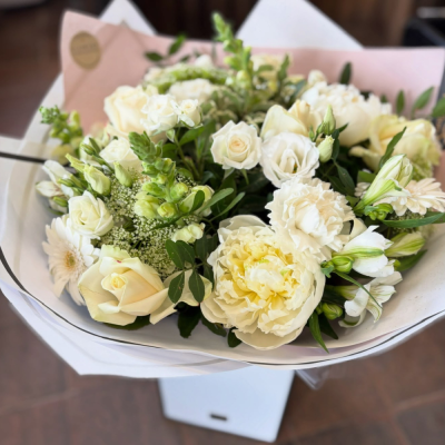 Elegant Embrace Bouquet - A luxurious hand-tied bouquet in elegant ivory and white tones, beautifully arranged to bring timeless beauty to any occasion.